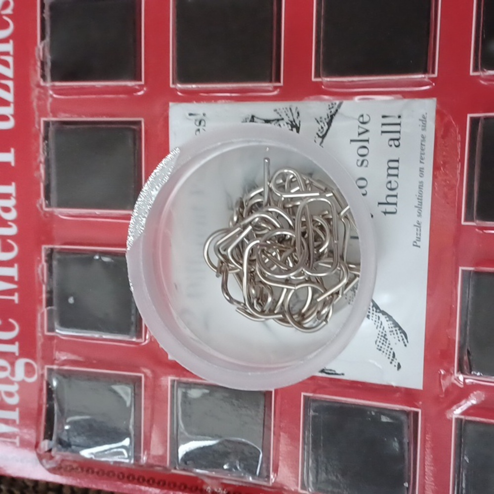4/$30 Magic Metal Puzzles Set - Silver - Picture 3 of 7